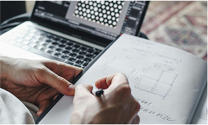 Two people collaborating over color swatches